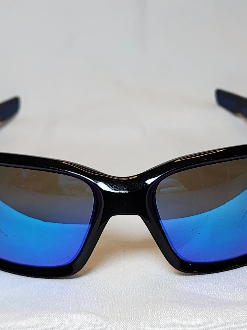Oakley Black Sunglasses with Blue-Purple Mirrored Lenses